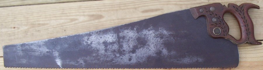 "Harvey Peace" saw made by Disston